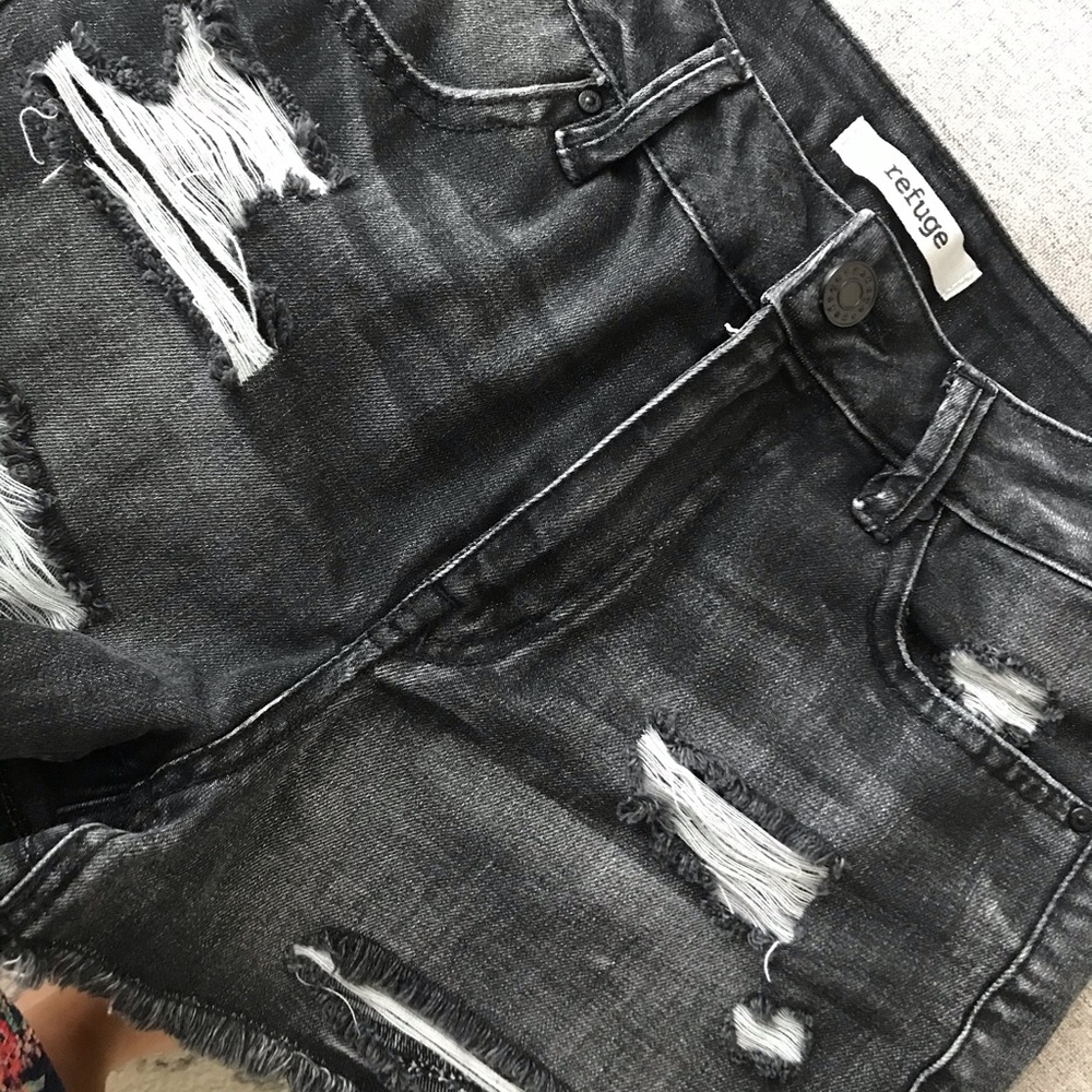 Distressed black denim shorts
